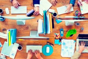 Group of Business People Working on an Office Desk